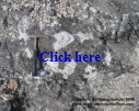 Marosohihy Mine: white plagioclase accumulations with corundum, see next photo.